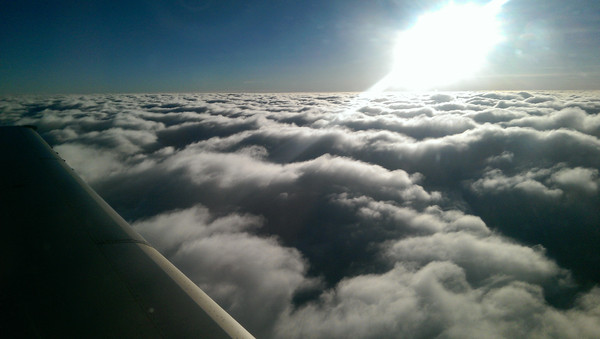 plane above the clouds